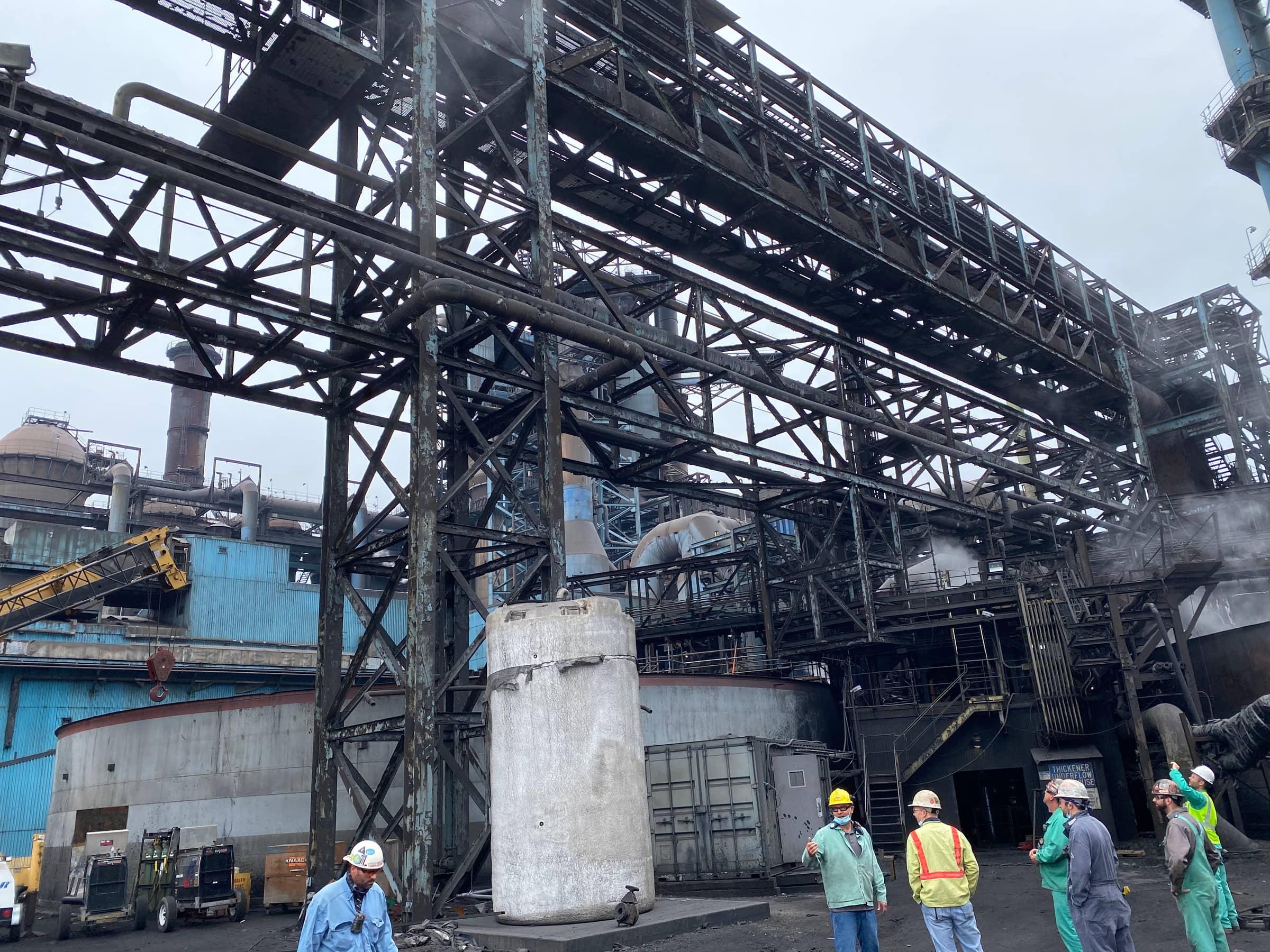 Industrial piping runs inside the plant